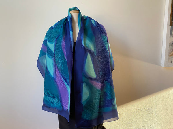 Hand painted silk shawl in navy, teal and purple. Art to wear.