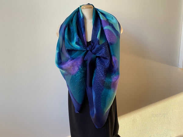 Hand painted silk shawl in navy, teal and purple. Art to wear.