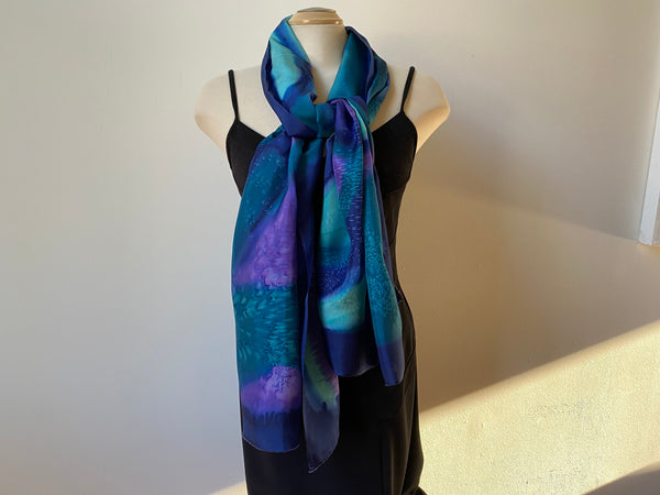 Hand painted silk shawl in navy, teal and purple. Art to wear.