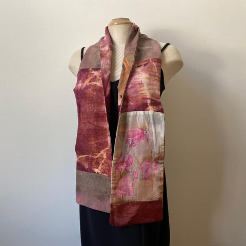 Hand painted and eco dyed silk scarf mafe of repurposed silk pieces.