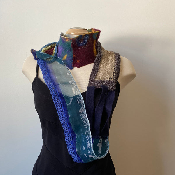 Art scarf made from handpainted silk, handmade felt, and hand crochet.