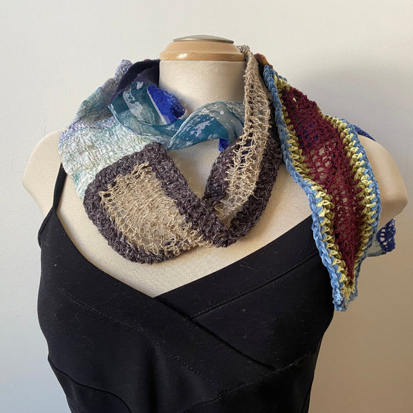 Art scarf made from handpainted silk, handmade felt, and hand crochet.