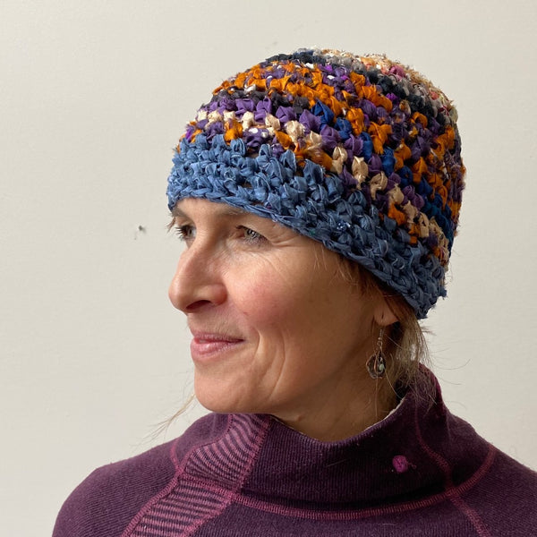 Silk hat crocheted from hand painted or eco dyed silk strips.