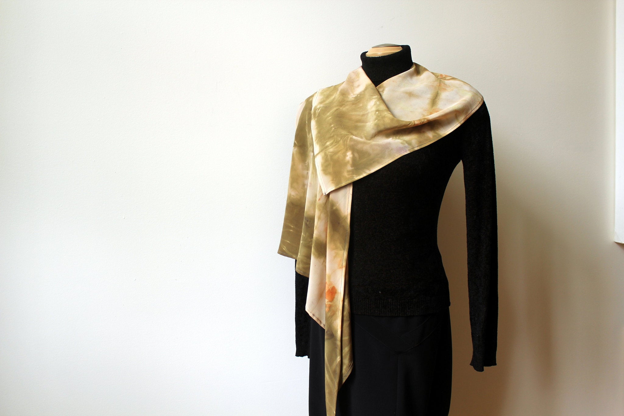 Eco dyed luxurious silk crepe-de-chine. Special cut lets you wear it as poncho or a scarf. Very versatile. Beautiful natural shades.